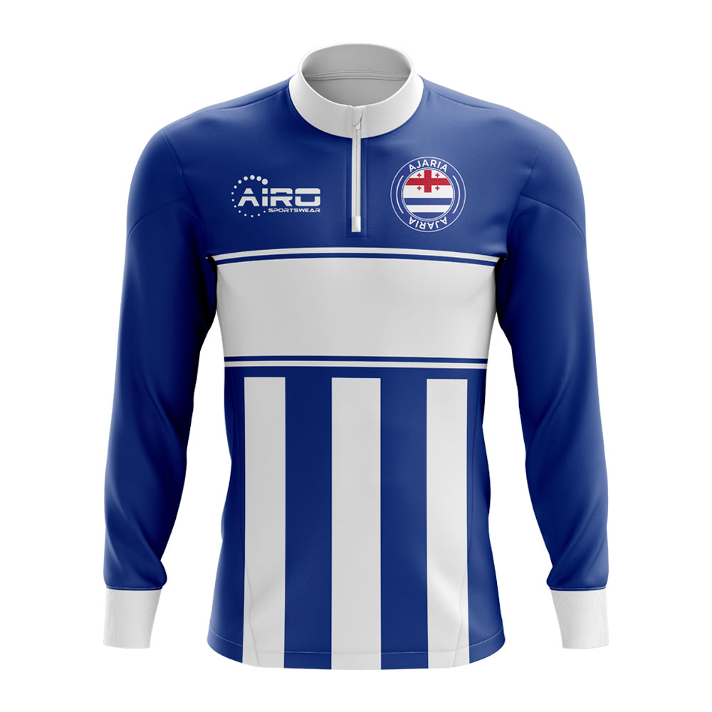 Click to view product details and reviews for Ajaria Concept Football Half Zip Midlayer Top Blue White.